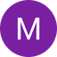 White letter M on a solid purple circle with a black background.